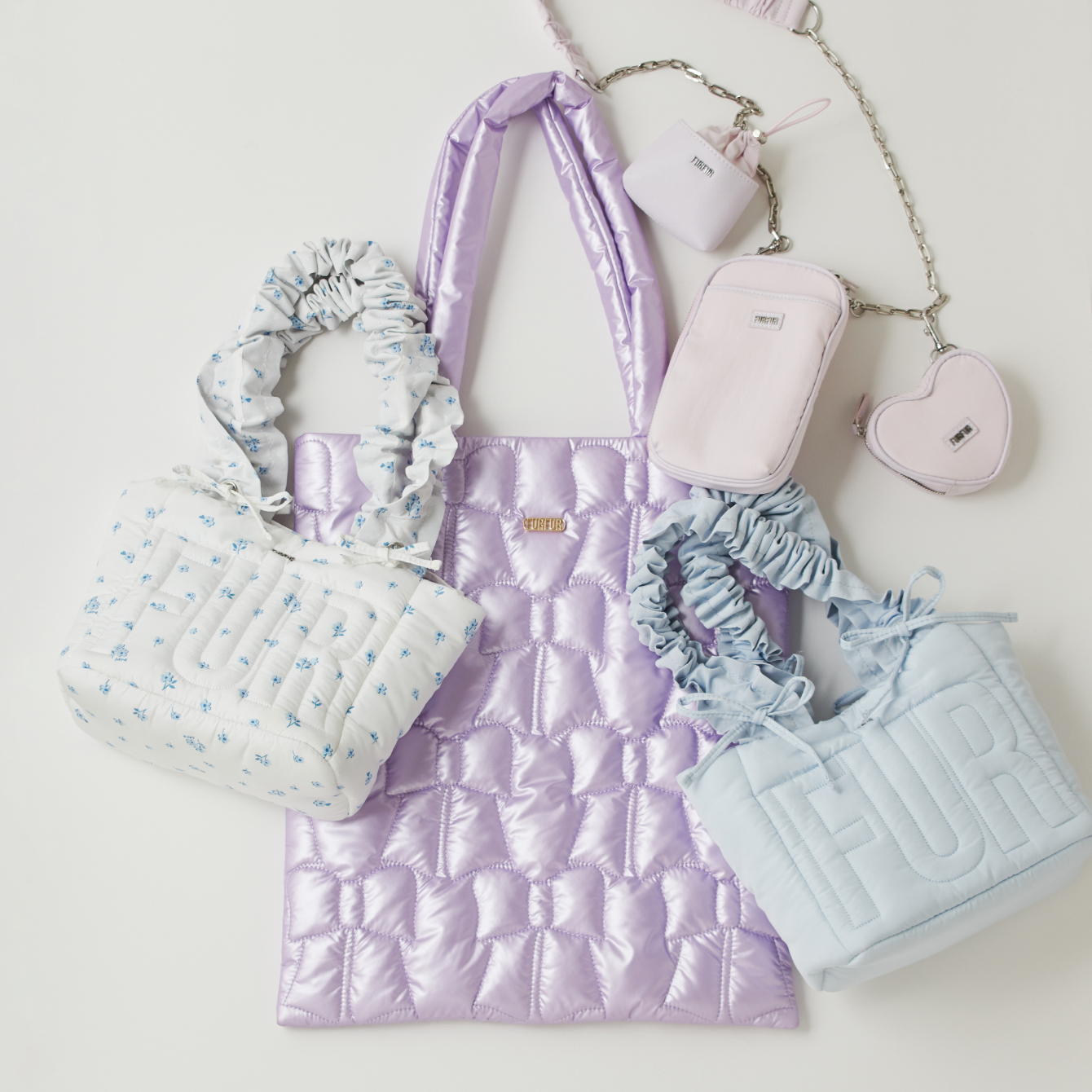 ロゴパデッドトートバッグ・リボンキルティングトートバッグの商品画像